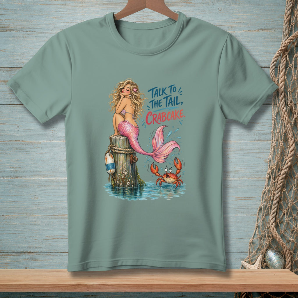Mermaid and crab with text "Talk to the tail, crabcake" on a teal t-shirt.
