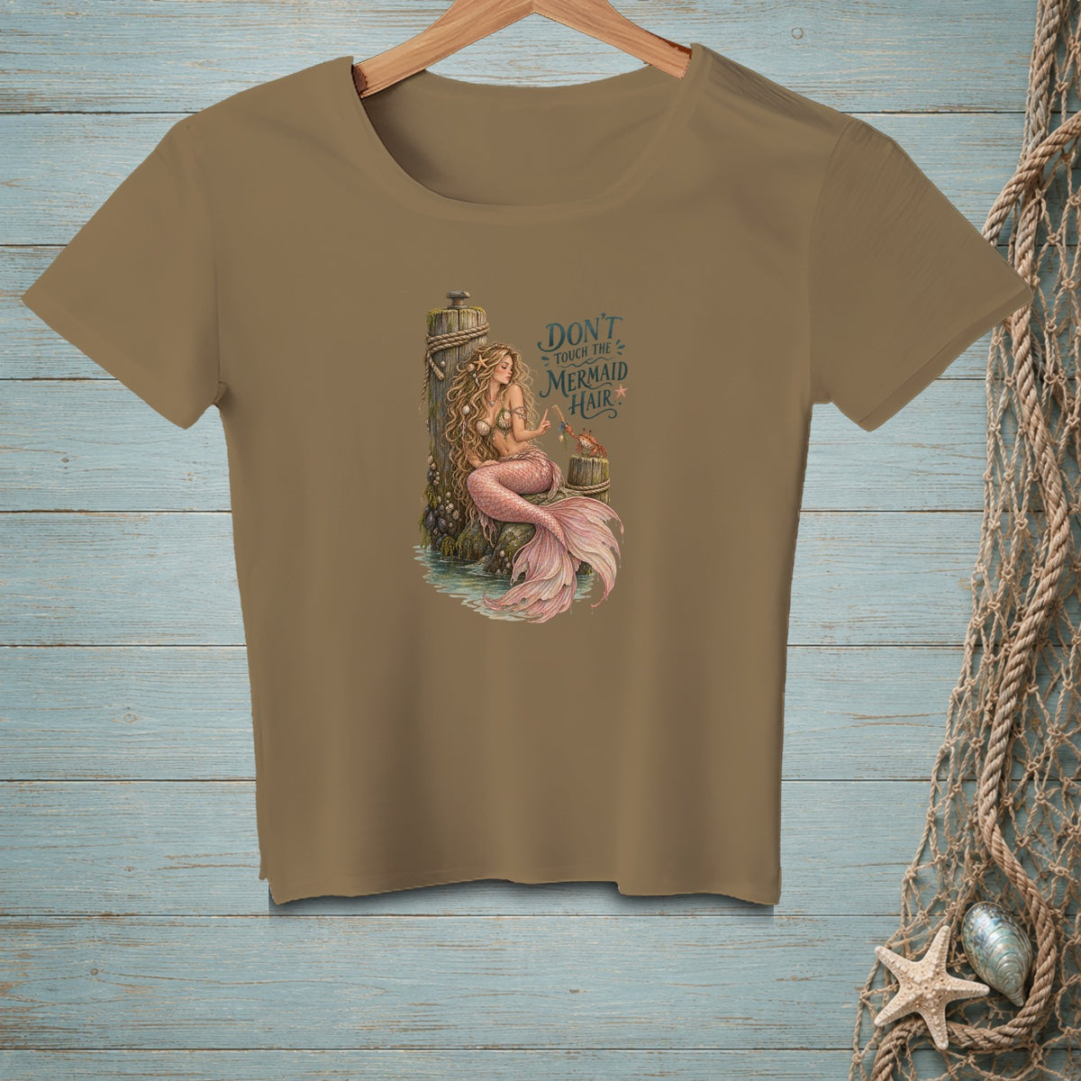 Brown t-shirt with mermaid graphic and text "DON'T TOUCH THE MERMAID HAIR".