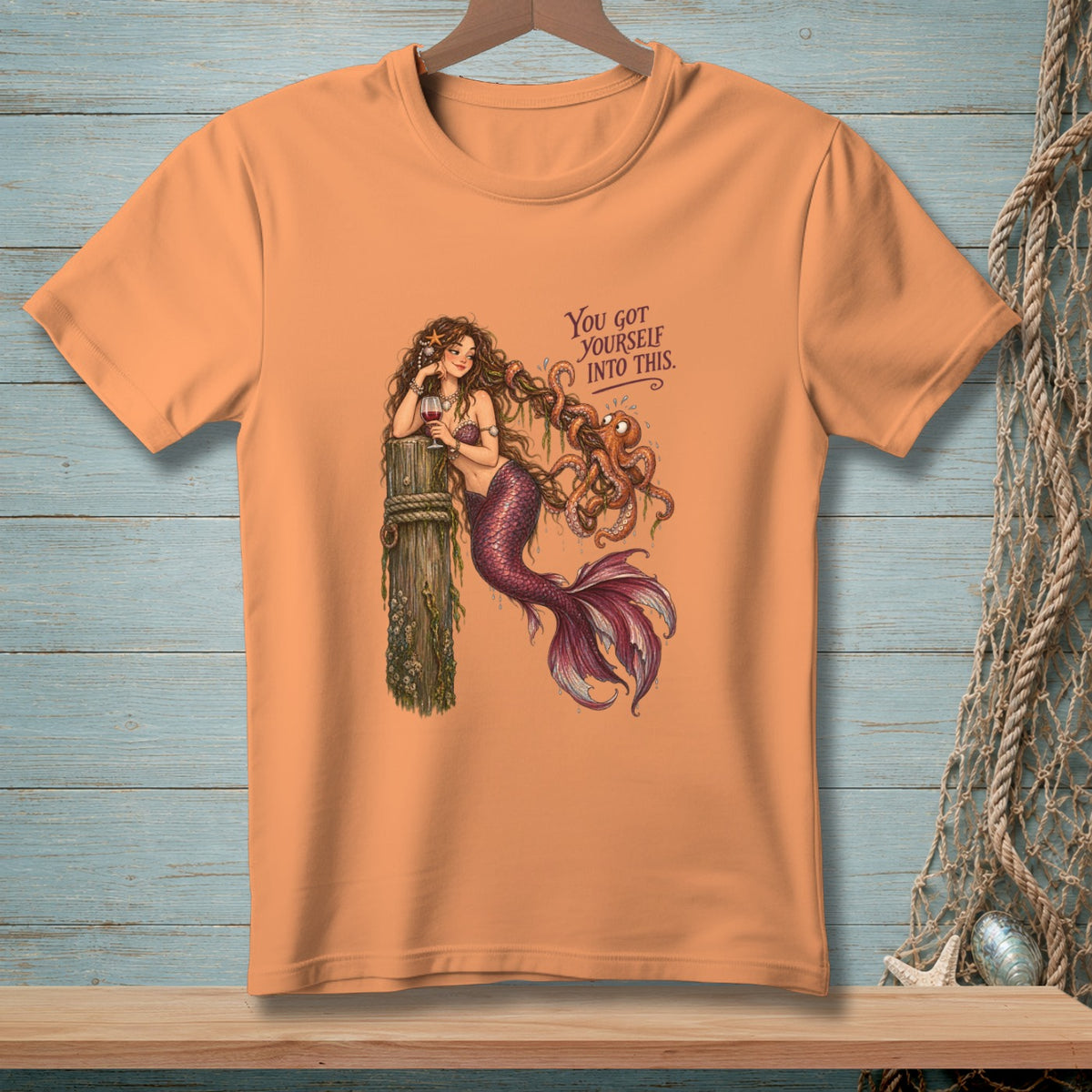Mermaid with octopus on weathered post, with text "YOU GOT YOURSELF INTO THIS."