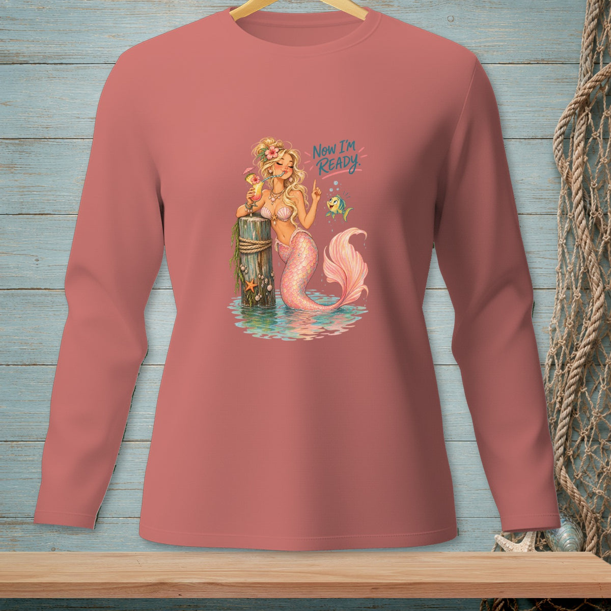 Blonde mermaid with pink tail drinks from a straw, with text "Now I'm READY."