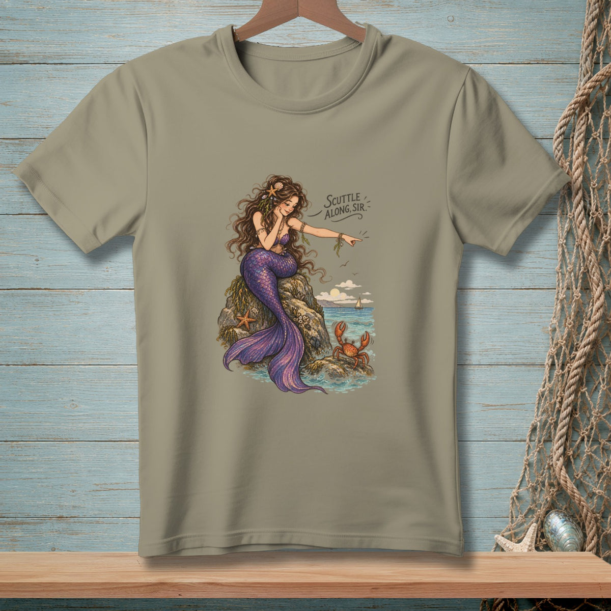 Mermaid on rock points to crab with text "Scuttle along, sir."