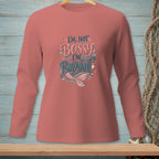 Salmon long-sleeve shirt with "I'm Not Bossy I'm Buoyant" text and mermaid tail graphic.