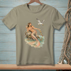 Mermaid on rock with drink, bird dropping olives, and spilled lemons into water.