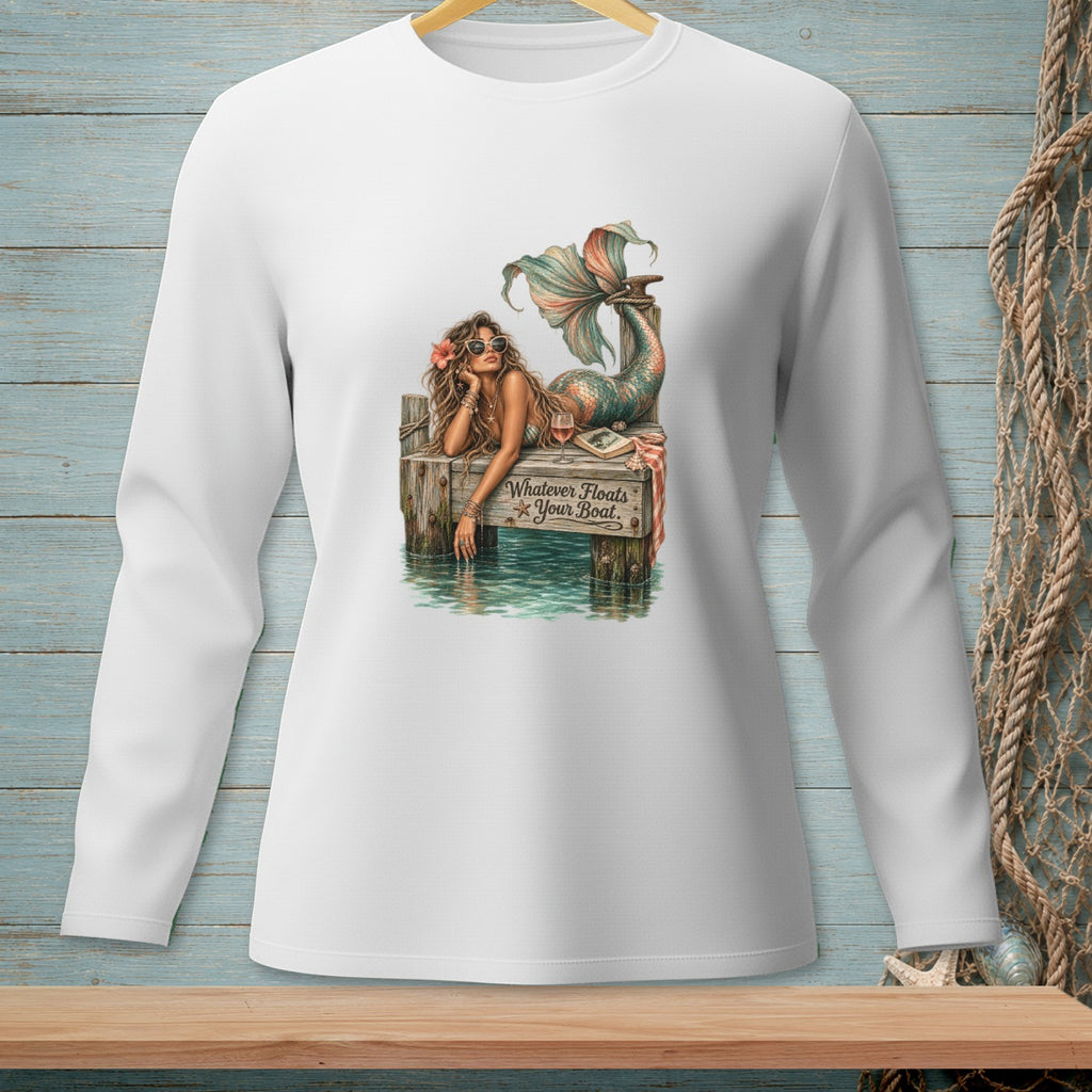 Long sleeve white shirt with mermaid on a dock graphic saying "Whatever Floats Your Boat".
