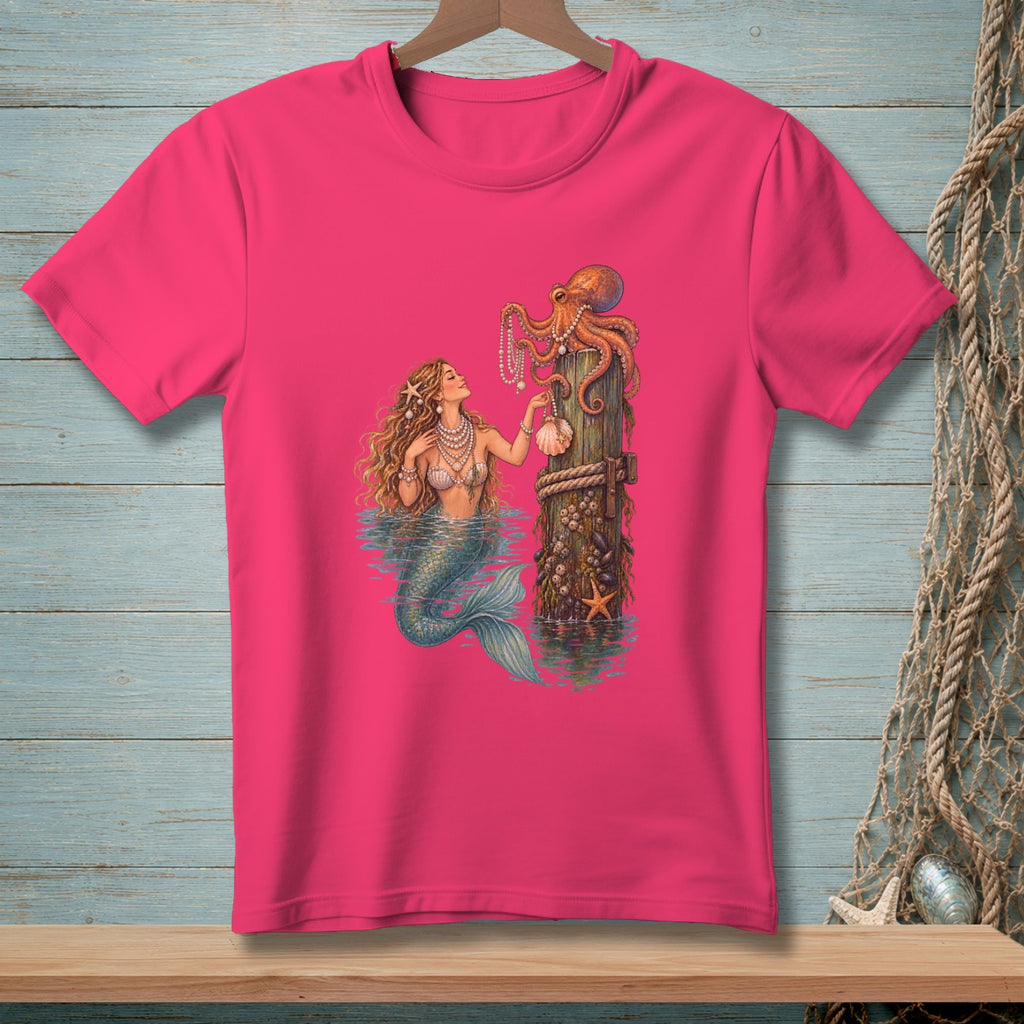 Mermaid with octopus on a wooden post with pearls and shells on a pink t-shirt.