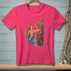 Mermaid with octopus on a wooden post with pearls and shells on a pink t-shirt.