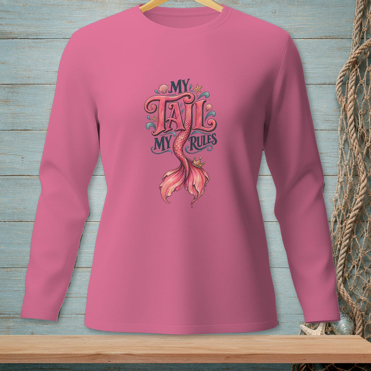 Pink long-sleeve shirt with "My Tail My Rules" and mermaid tail graphic.
