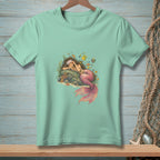 Light mint t-shirt with sleeping mermaid, fish, and coral graphic.