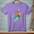 Mermaid with drink and fish, sitting by buoy with seagull.