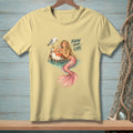 Light yellow t-shirt with a mermaid, seagull, and "Know Your Lane" text.
