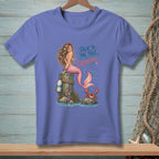 Mermaid sitting on a post with a crab below, with text "Talk to the Tail, Crabcake".