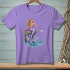 Mermaid with champagne and crab on a dock, throwing shell labeled "Done".