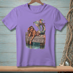 Lavender t-shirt with mermaid graphic and text "Whatever Floats Your Boat."
