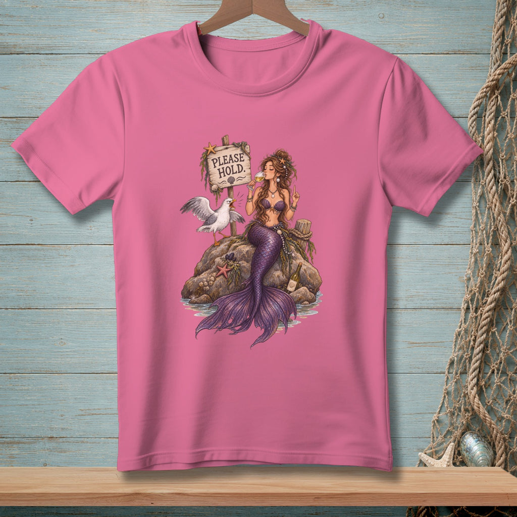 Mermaid drinks wine by a sign reading "PLEASE HOLD" with a seagull and starfish.
