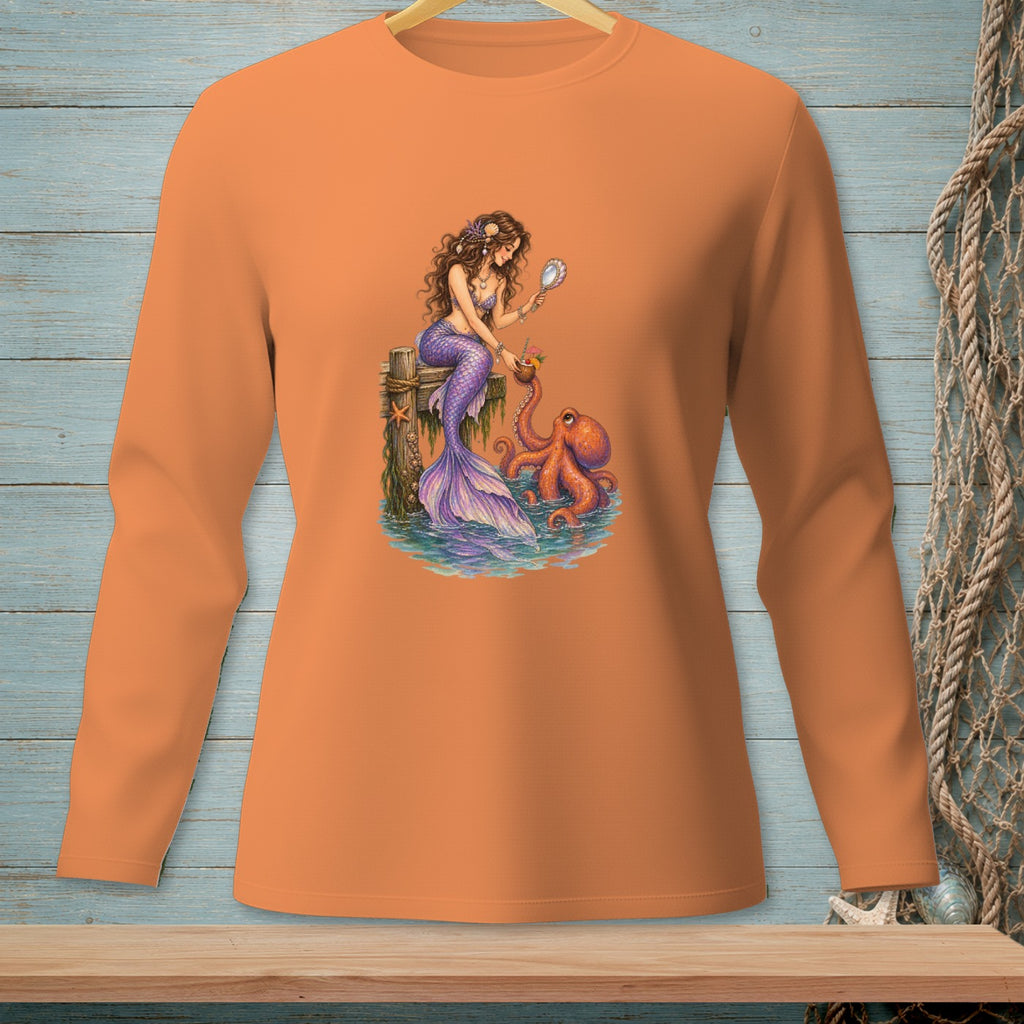 Mermaid with octopus on a pier, holding a mirror and a drink.
