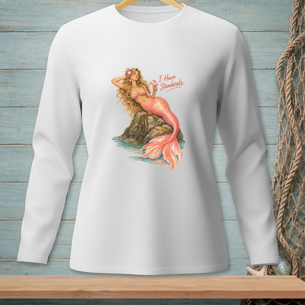 White long-sleeved shirt with a graphic of a mermaid holding a drink and text "I Have Standards".