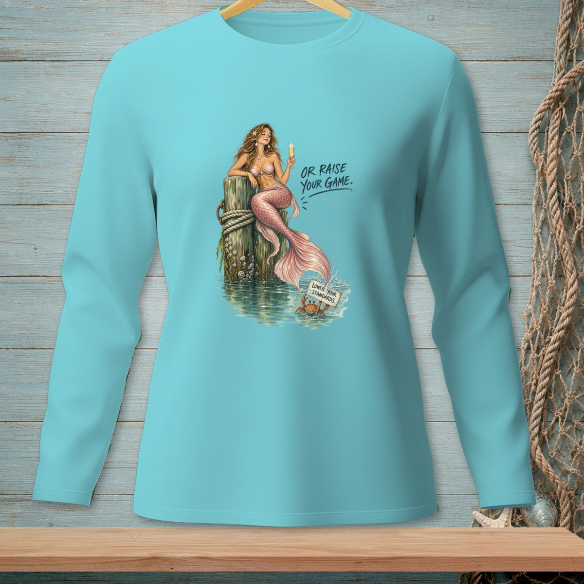 Mermaid on piling with drink, text "OR RAISE YOUR GAME." and crab with sign.