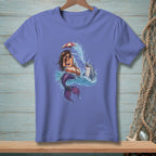 Mermaid with umbrella and dolphin splashing in the ocean on a t-shirt.