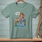 Mermaid sitting on dock pointing at crab with speech bubble, "Put that anywhere else."