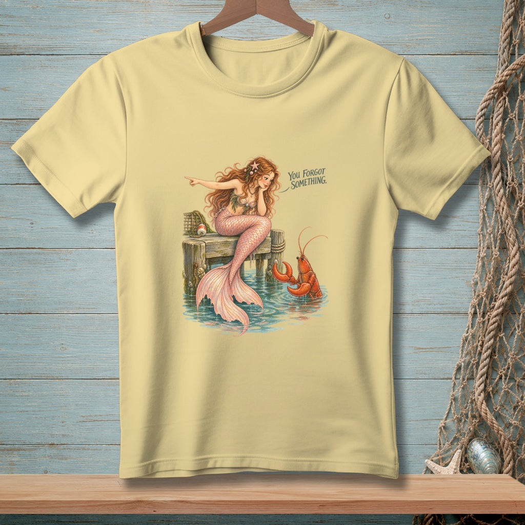 Mermaid pointing at lobster with text "You Forgot Something."