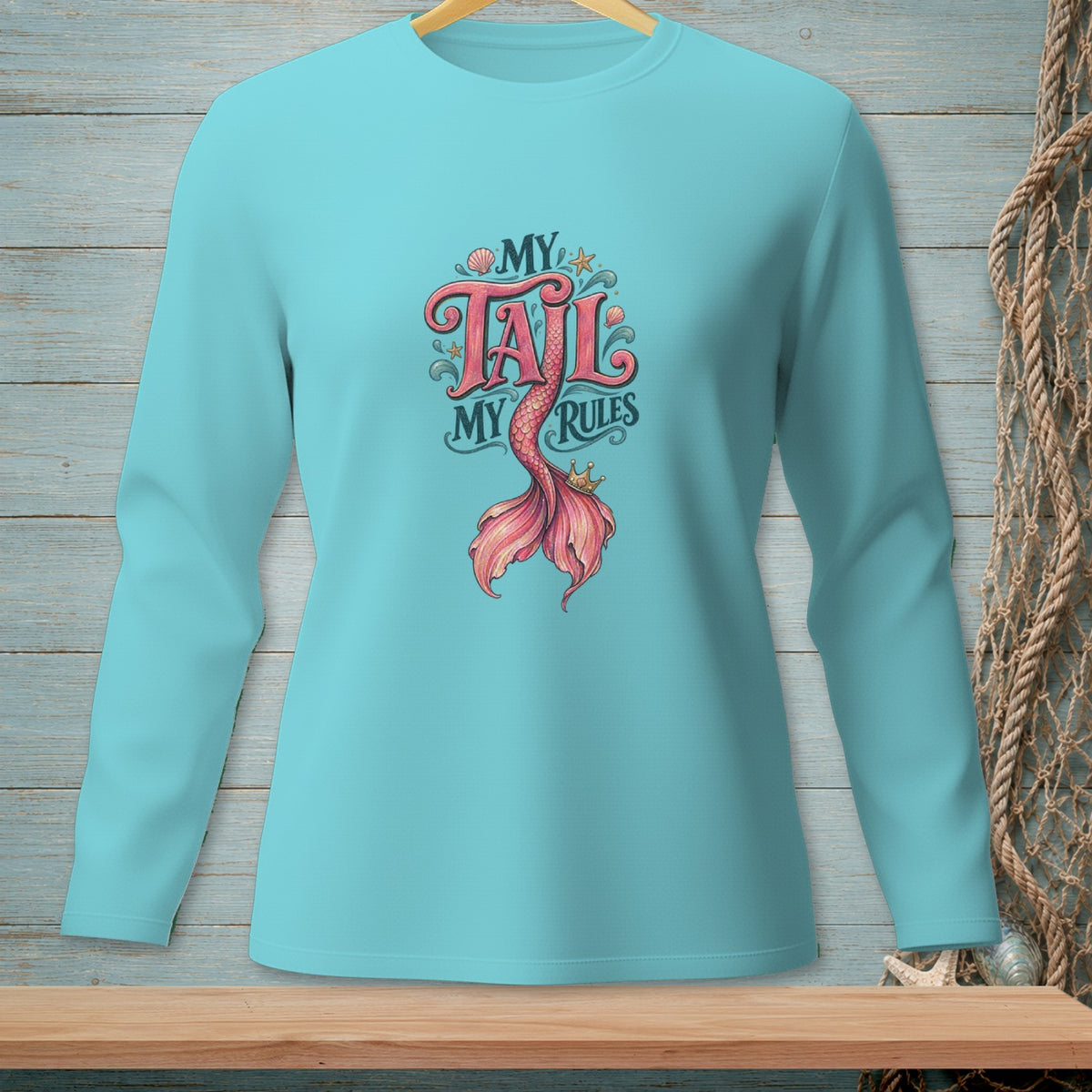 Teal long-sleeve shirt with mermaid tail graphic reading "My Tail, My Rules."