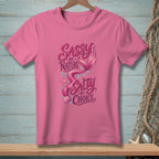 Pink t-shirt with "Sassy by Nature, Salty by Choice" mermaid graphic.