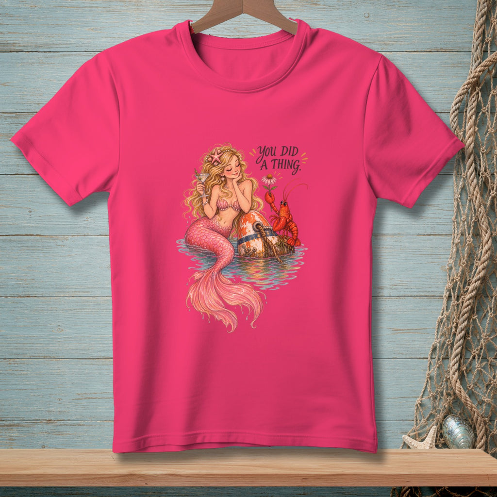 Pink t-shirt featuring a mermaid, lobster, and buoy with the text "YOU DID A THING."