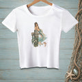 White t-shirt with illustration of a mermaid sitting on a dock with fish and a goldfish.
