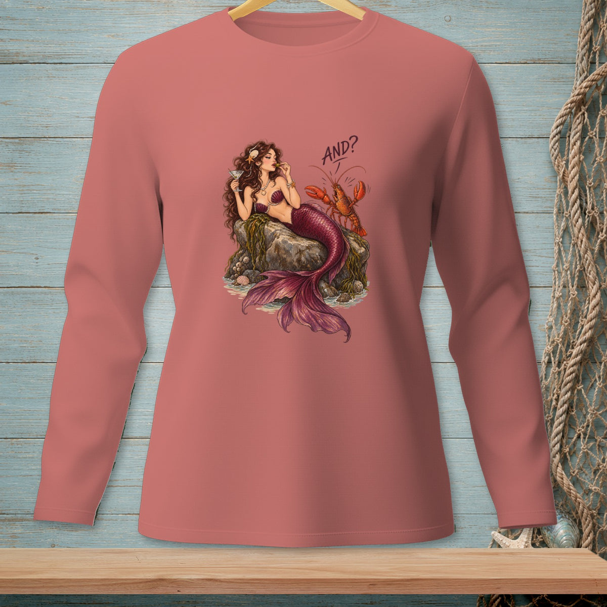 Mermaid holding a martini with a lobster and text "AND?"