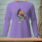 Mermaid applying makeup to a fish on a dock.