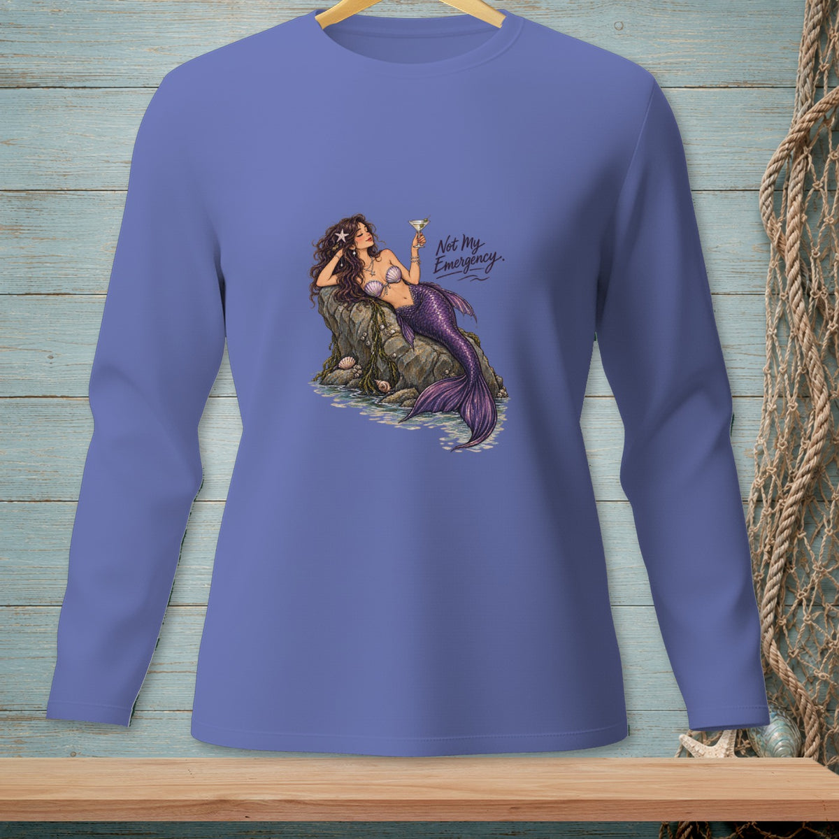Illustration of a mermaid with purple tail holding a drink and text "Not My Emergency".