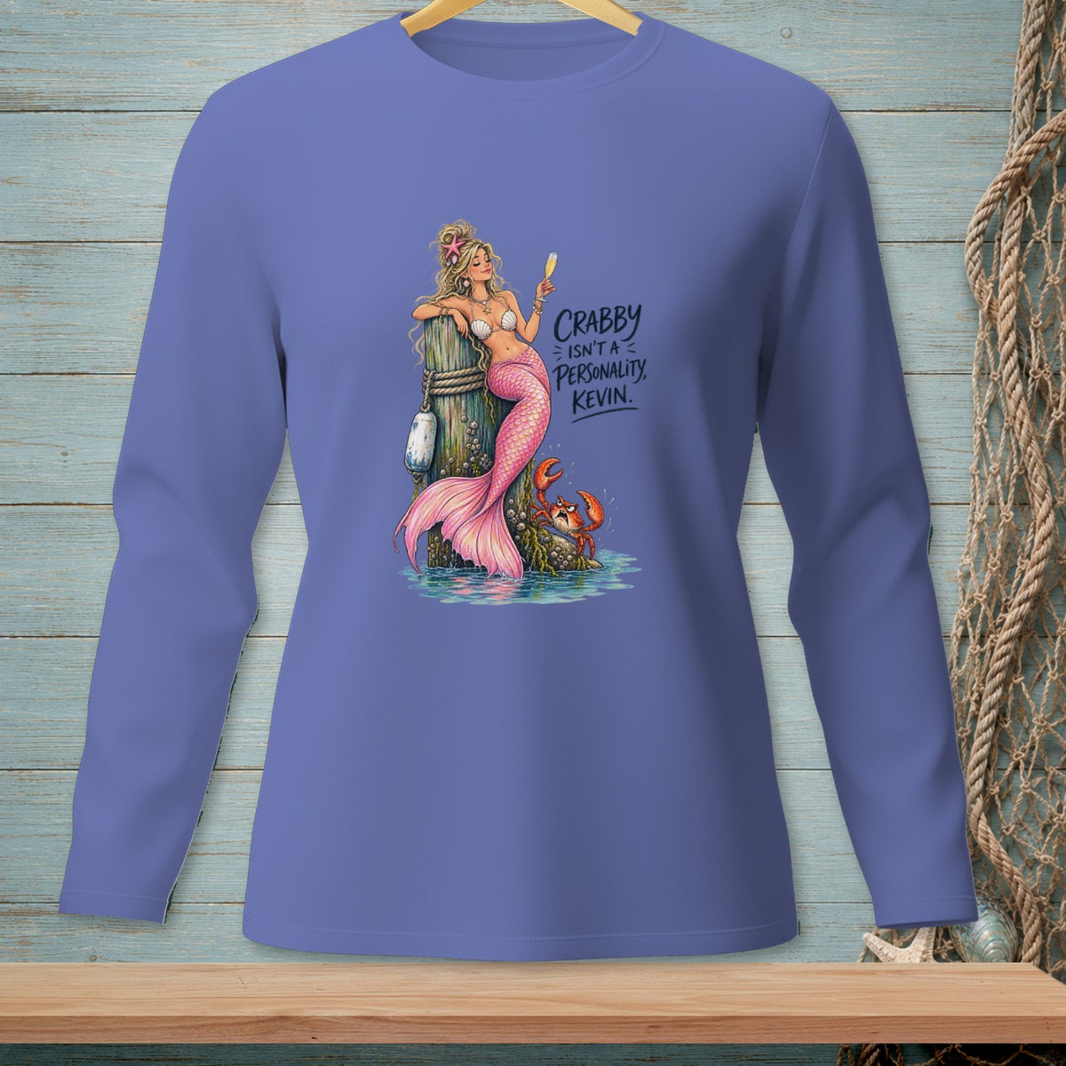 Mermaid with pink tail holding drink, crab, text "Crabby isn't a personality, Kevin."