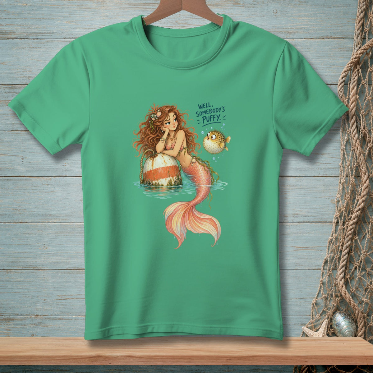 Mermaid and pufferfish with text "Well, Somebody's Puffy!".
