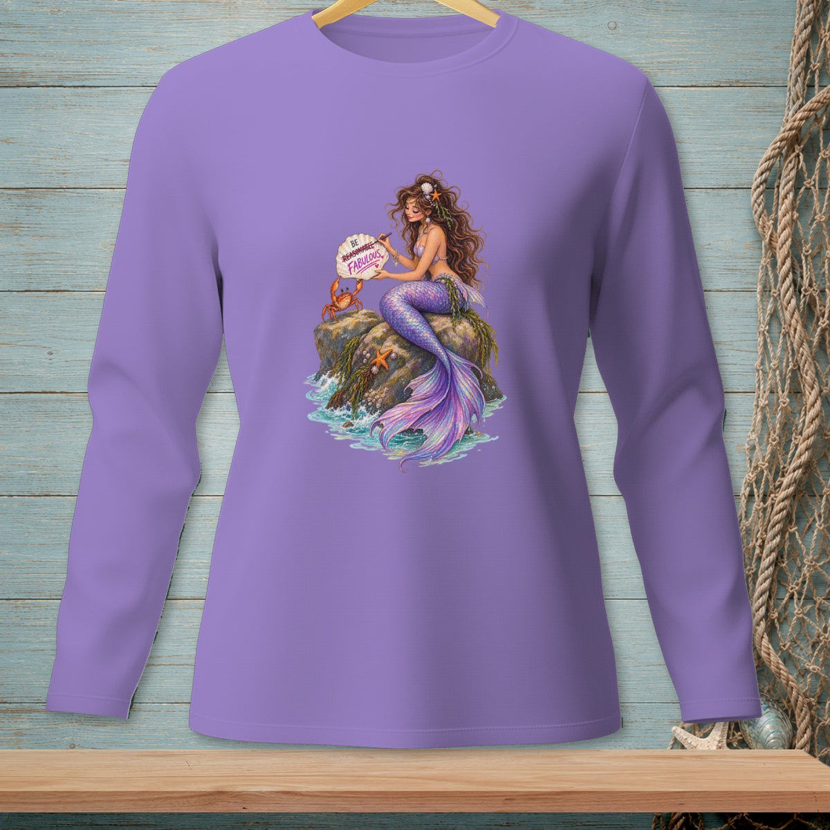 Purple long-sleeve shirt with mermaid sitting on rock writing "Be Reasonable. Fabulous."