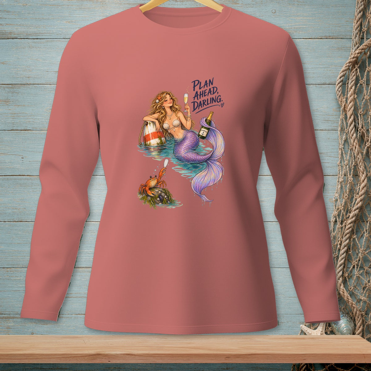 Mermaid with champagne and crab, with text "PLAN AHEAD, DARLING."