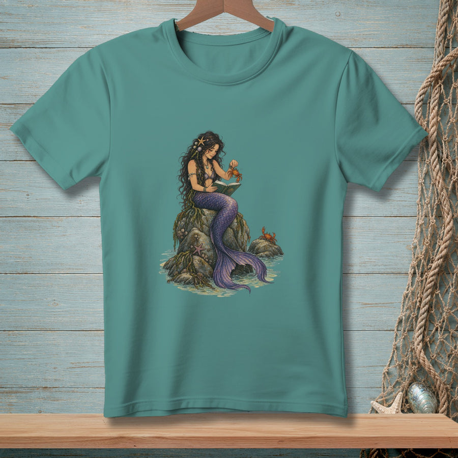 T-shirt with a mermaid reading to a crab on a rock.