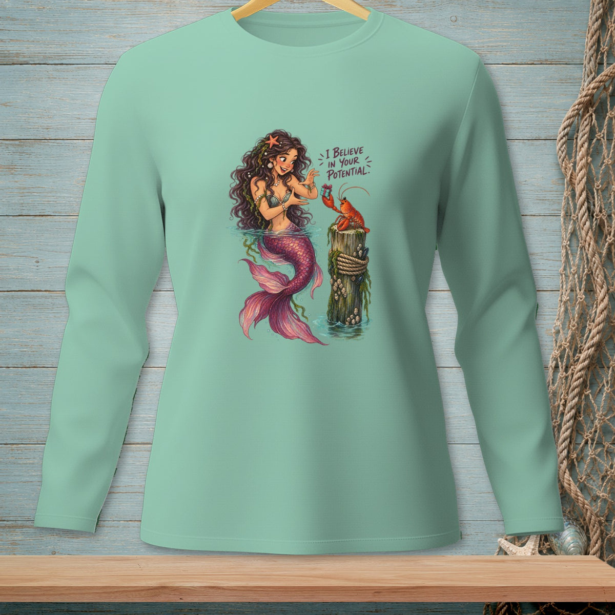 Mermaid giving a gift to a lobster on a post with text "I Believe In Your Potential."