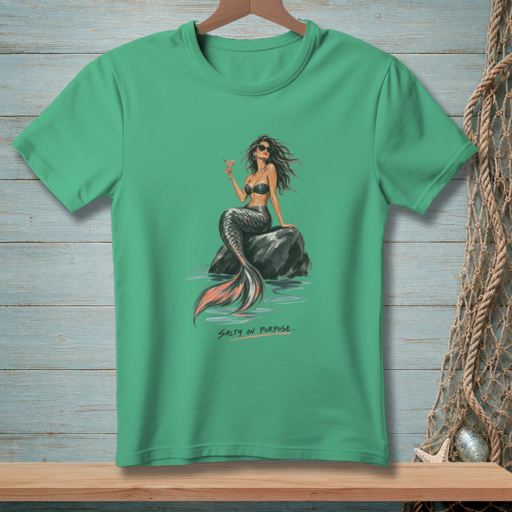 Green t-shirt with a mermaid sitting on a rock, holding a drink. Text reads "SALTY ON PURPOSE."
