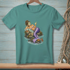 Mermaid with cucumber eyes, seashell bikini, and drink relaxes on rocks.