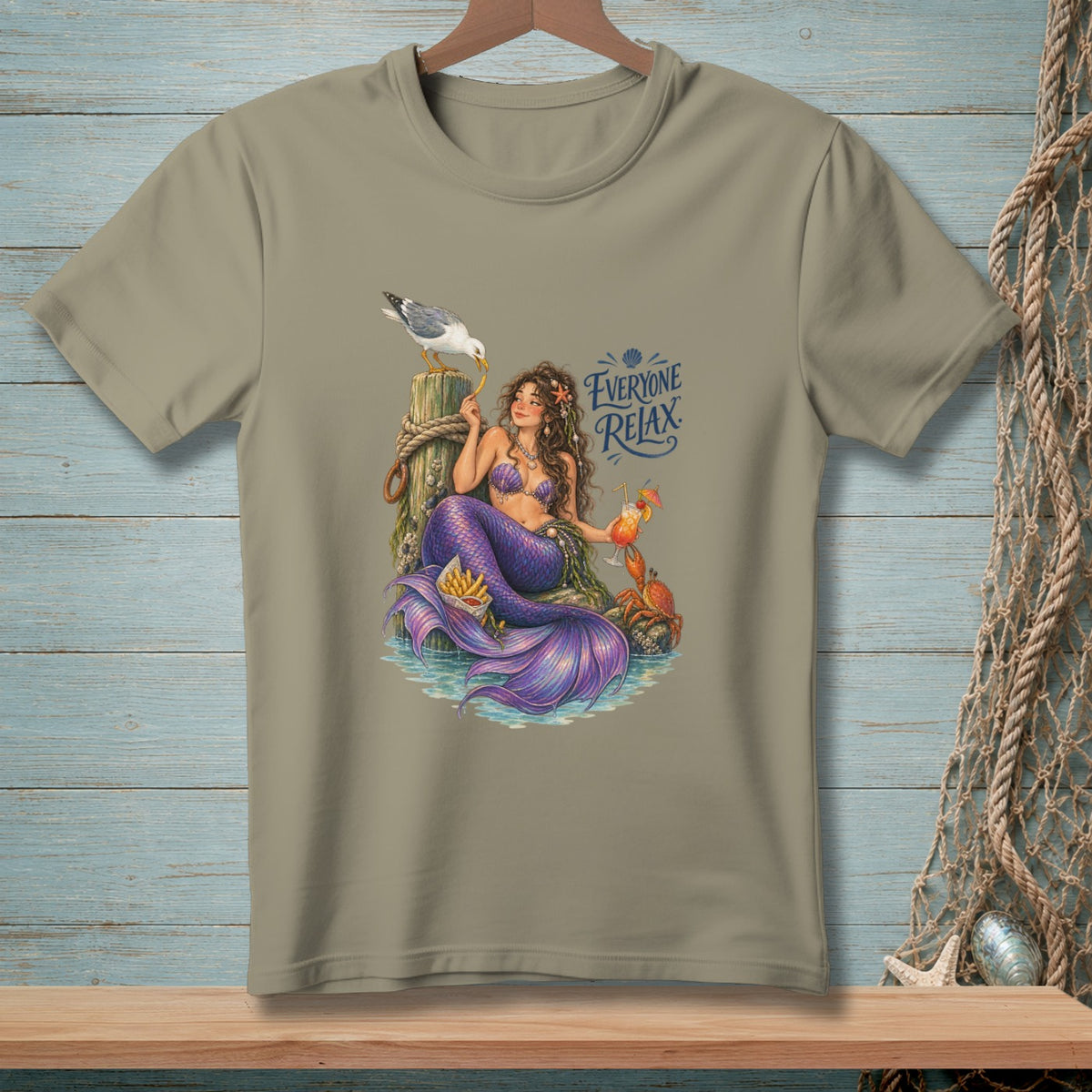 Mermaid with purple tail and seashell bikini, holding cocktail, with seagull, crab, and text "Everyone Relax".