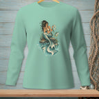 Mint long-sleeve shirt featuring a mermaid sitting on rocks with a fish.
