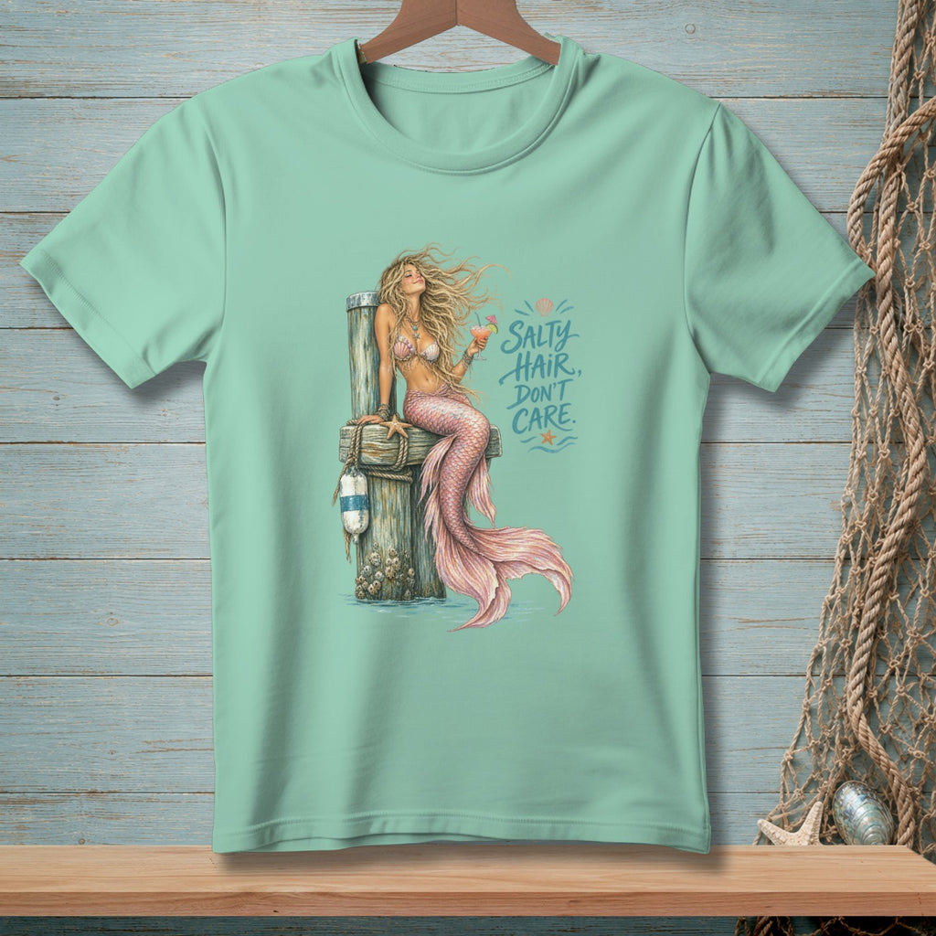 Mint t-shirt with a mermaid graphic and text that reads "Salty Hair, Don't Care."