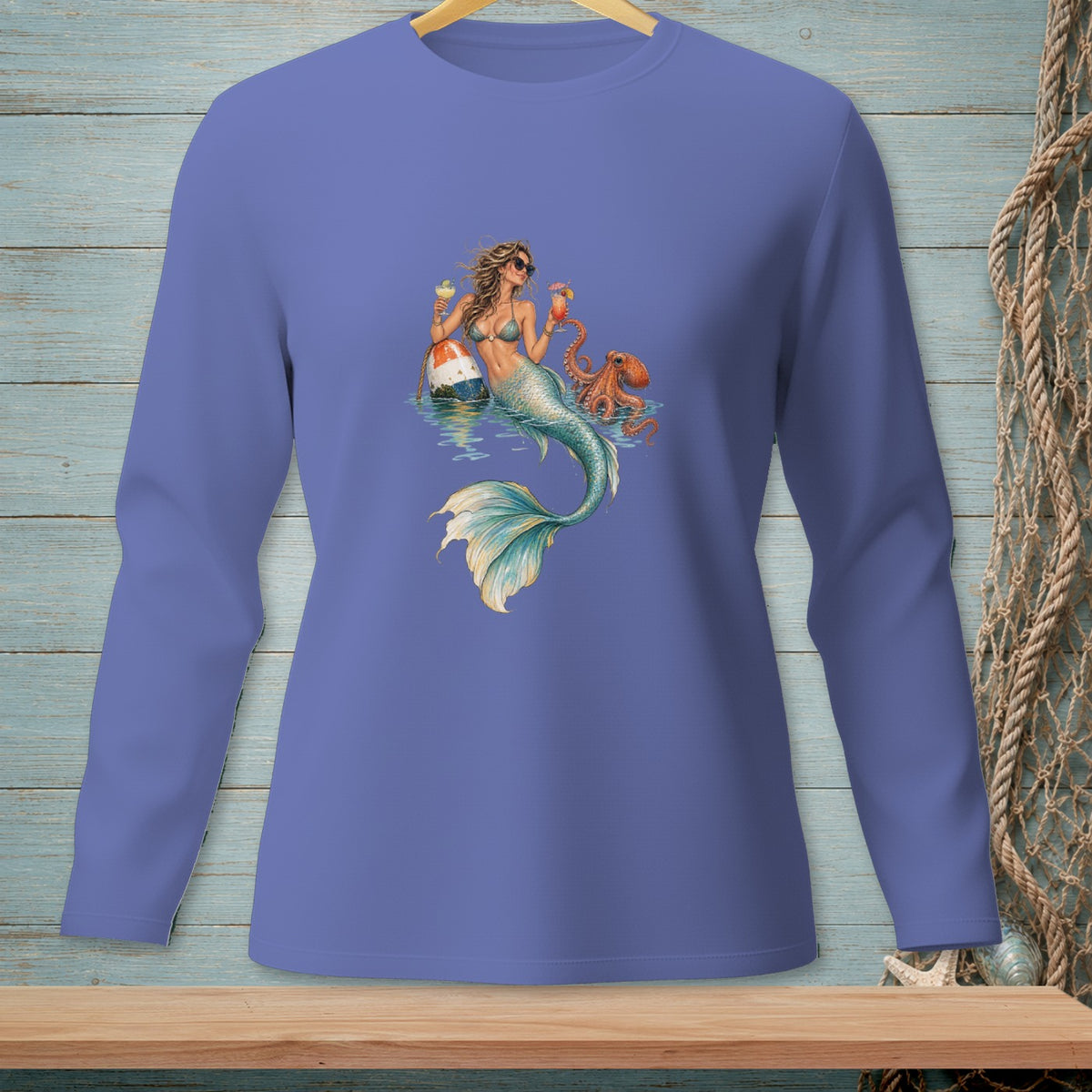 Mermaid with cocktails sits on buoy next to octopus.