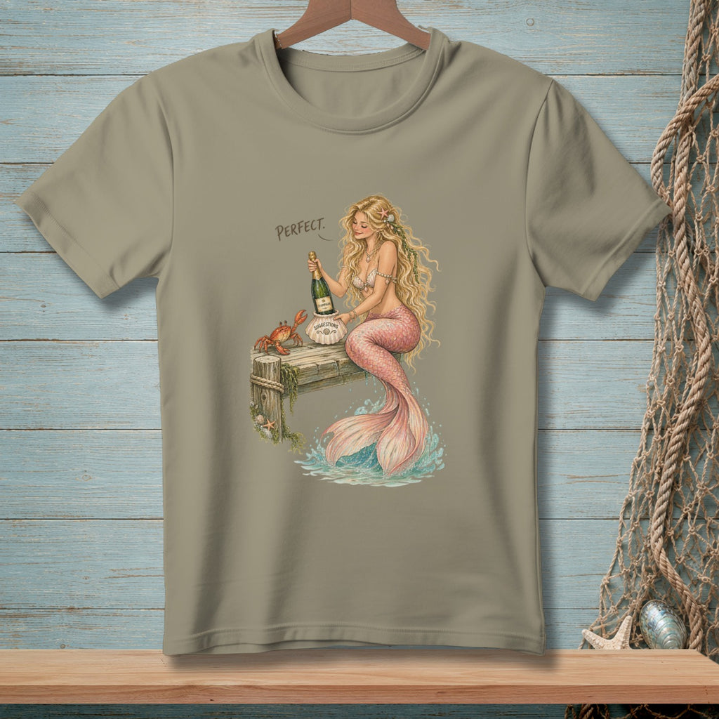 Mermaid with champagne and a crab on a dock, with the word "PERFECT."