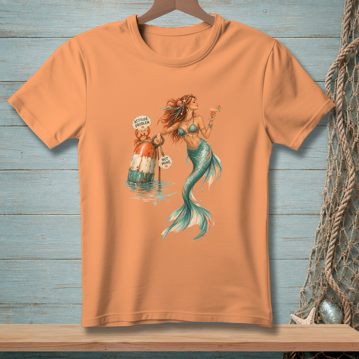 Mermaid with cocktail near buoy, saying "attitude problem" and "not mine."