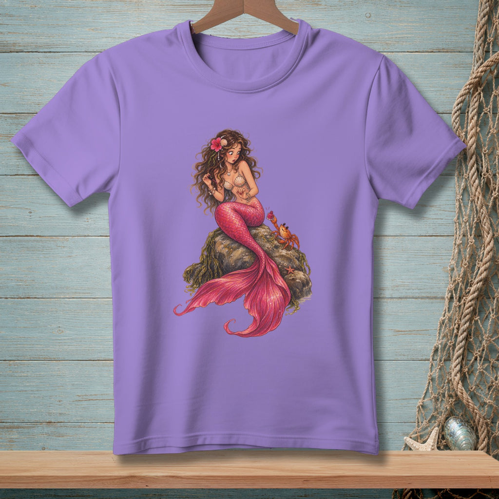 Purple t-shirt featuring a drawing of a mermaid on a rock with a crab.