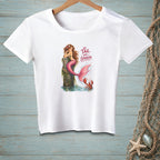 White t-shirt with a mermaid, lobster, and text "The Tail Has Spoken".