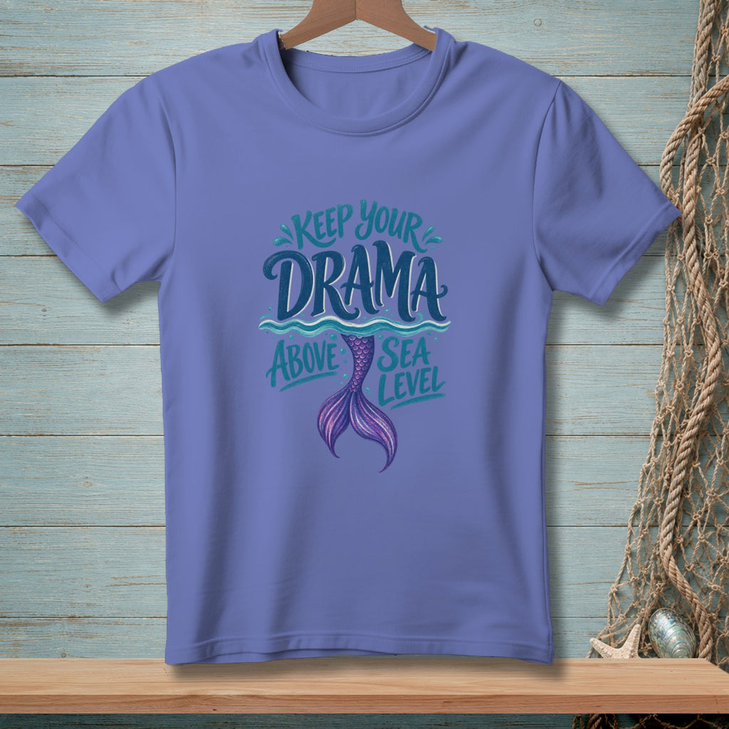 Purple t-shirt with text "Keep Your Drama Above Sea Level" and mermaid tail graphic.
