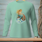 Mermaid with long blonde hair sits on a rock with a lobster and pearl.
