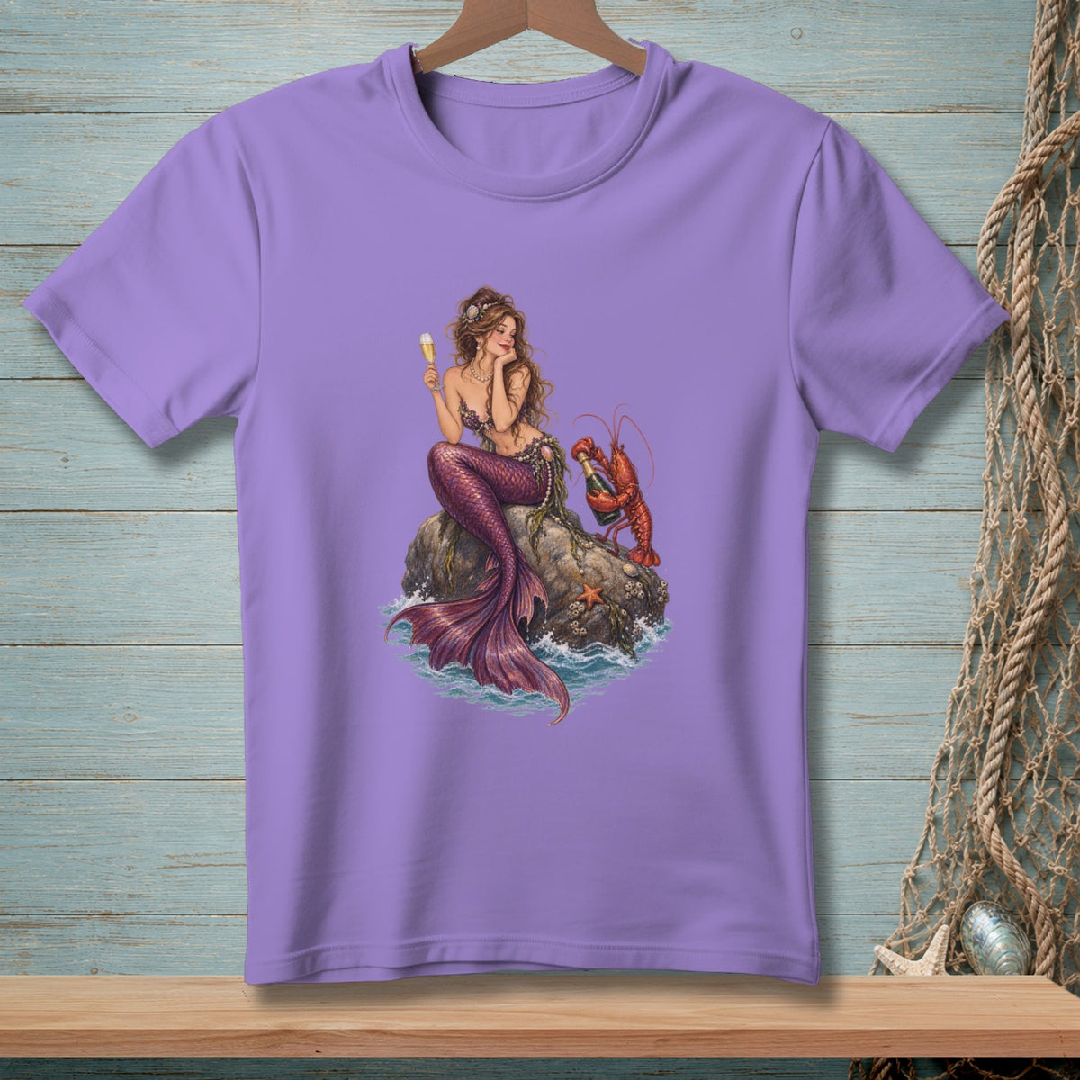 Mermaid holding drink with lobster on rock, printed on purple t-shirt.
